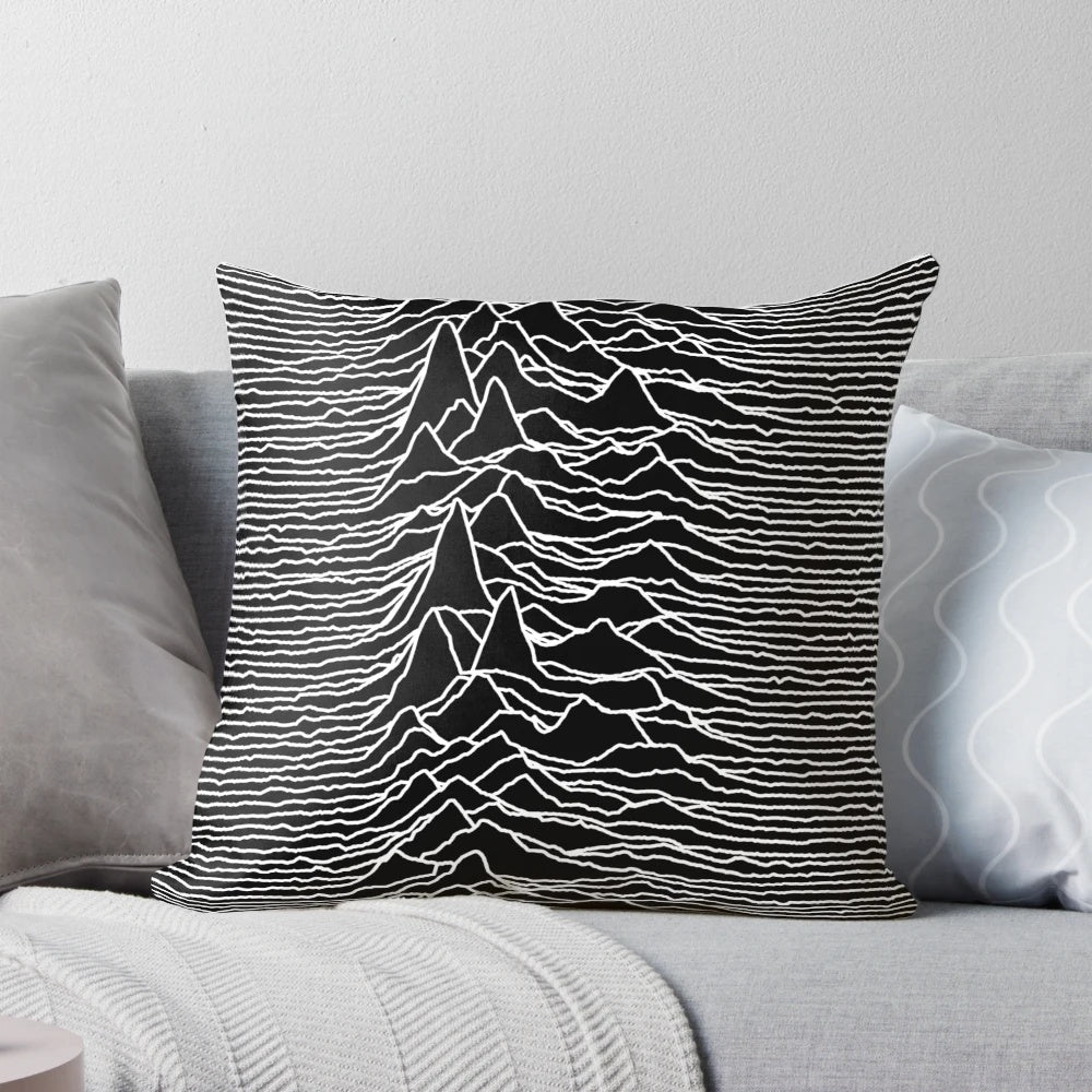 A dark, abstract art-inspired pillow featuring a design inspired by the iconic album cover of the 1970s-1980s indie rock band