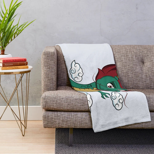 Anime-inspired chibi dragon plush blanket with red hair and kawaii design