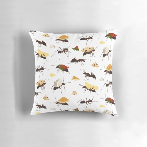 Decorative pillow featuring cute illustration of ants carrying various snacks
