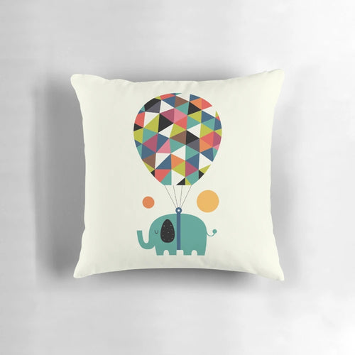 Colorful baby elephant pillow with rainbow design, perfect for kids' room or nursery