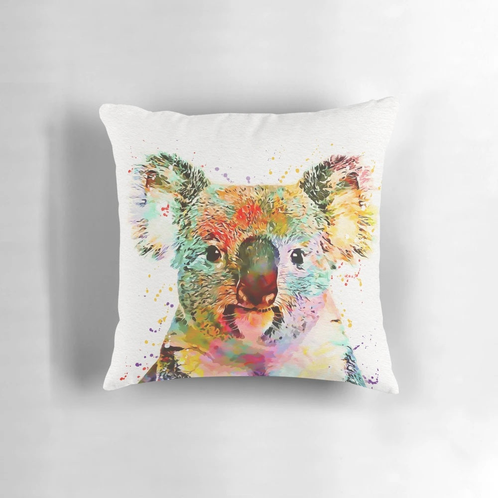 Whimsical watercolor painting of a baby koala on a soft, plush pillow.