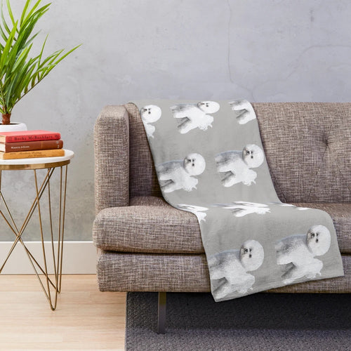 Beautiful illustration of a standing Bichon Frise dog on a plush blanket