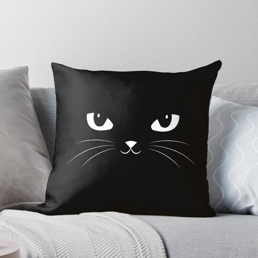 Charming black cat graphic on a plush, soft throw pillow for cozy home styling.