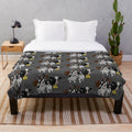 Plush blanket featuring cute cartoon illustrations of farm animals and pets