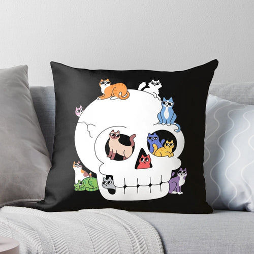Whimsical throw pillow featuring a cute cat face peeking out of a skull, perfect for cat lovers