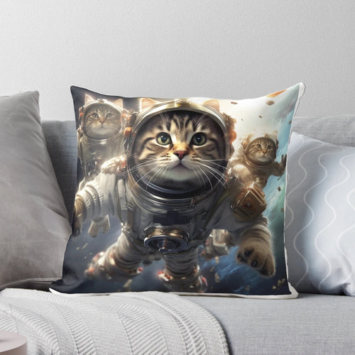 Whimsical pillow featuring cute cats floating in outer space