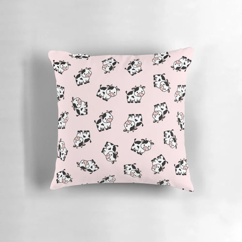 Soft, cuddly cow pillow with a pink and white design, perfect for adding a touch of country charm to any space.