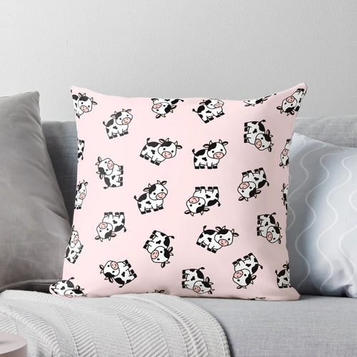 Soft, cuddly cow pillow with a pink and white design, perfect for adding a touch of country charm to any space.