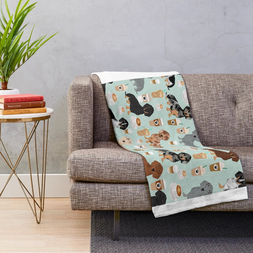Cute dachshund dog cartoon design on a plush blanket
