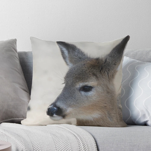 Soft, plush deer pillow featuring a realistic image of a deer
