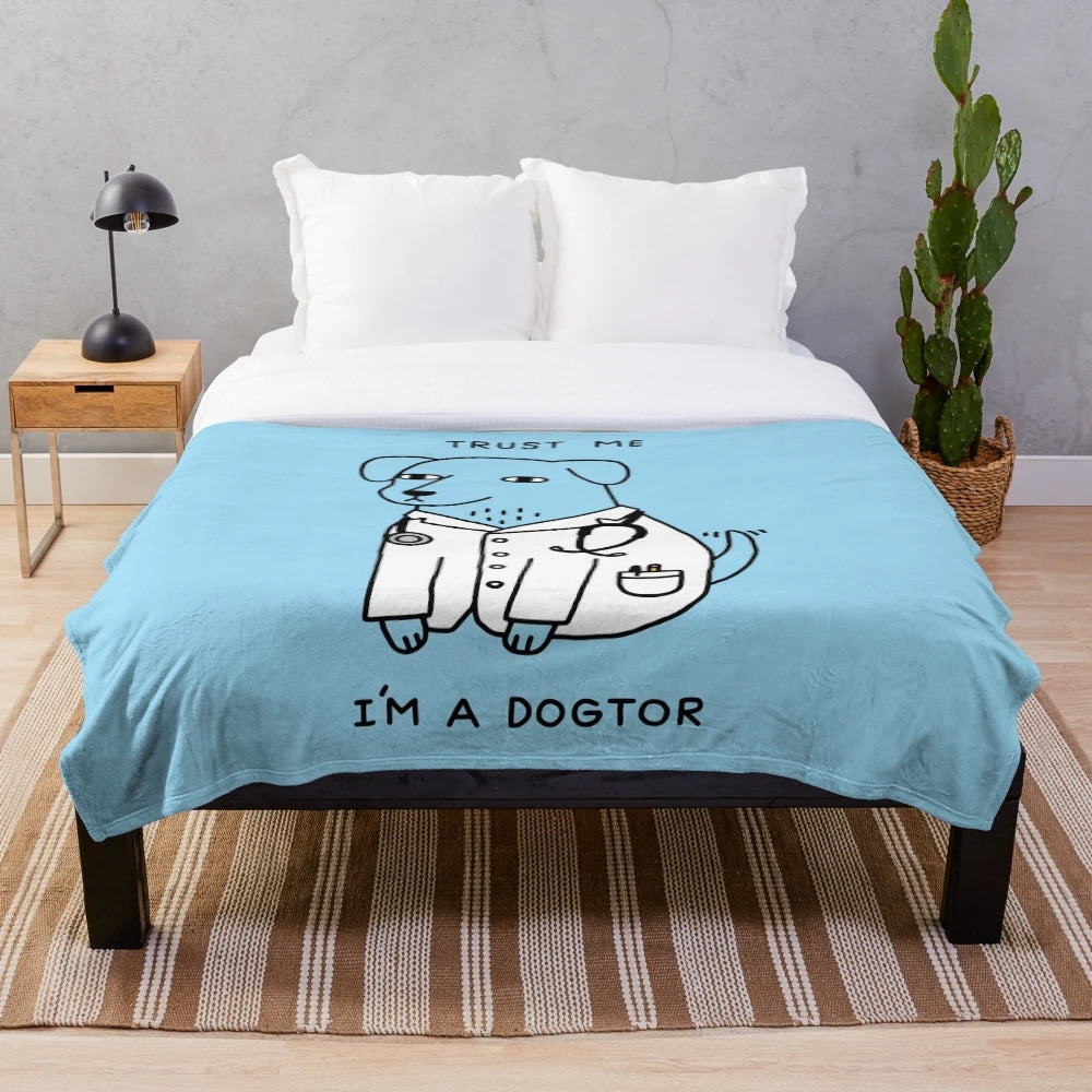 Cute dog in plush blanket with stethoscope, medical supplies