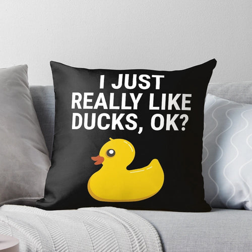 Soft, plush pillow featuring a whimsical duck graphic design, perfect for duck enthusiasts.