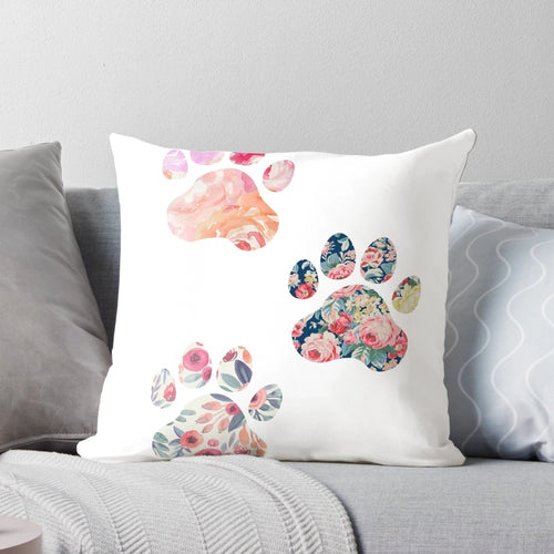Soft, plush pillow featuring a trio of cute floral paw prints, perfect for dog owners and animal lovers.