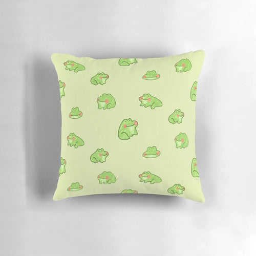 A soft, plush pillow featuring a playful design of two happy little frogs, perfect for adding a touch of whimsy to any space.