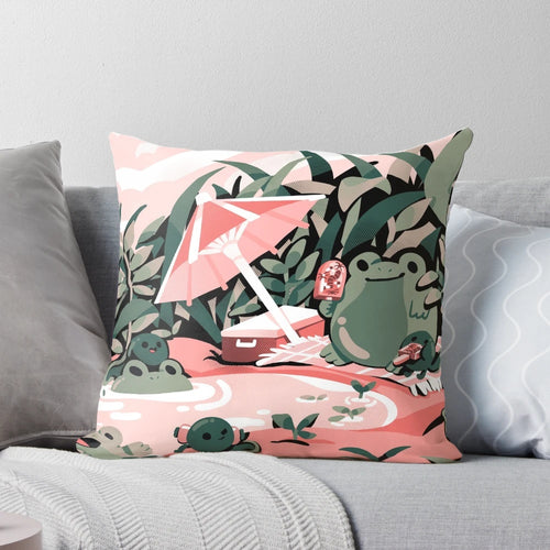 A soft, plush pillow featuring a charming illustration of a frog in a playful, nature-inspired design.