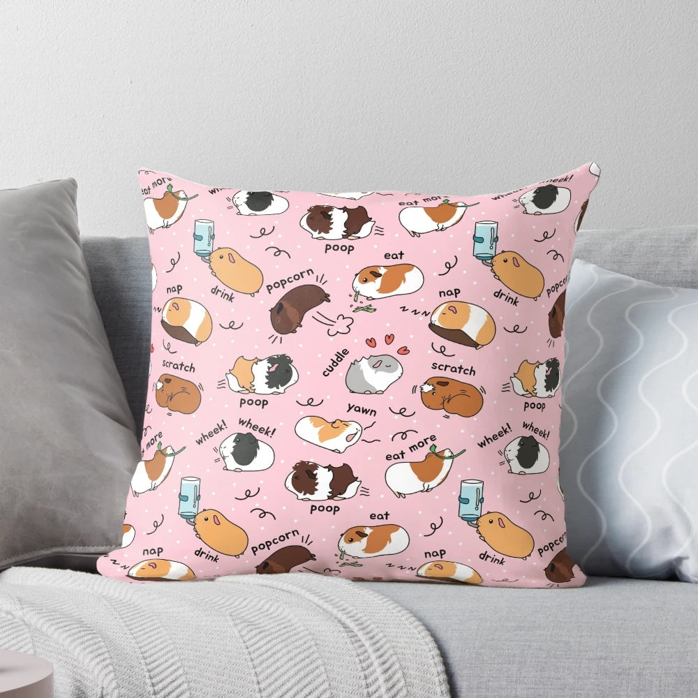 Soft pink pillow with a cute guinea pig and its daily routine printed on it.