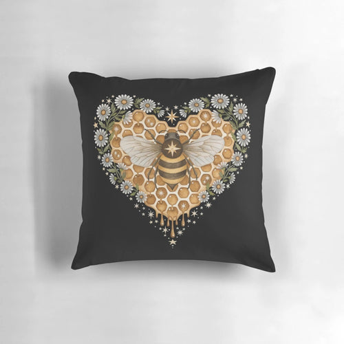 Soft, plush heart-shaped pillow featuring a sweet bee design, ideal for Valentine's Day or any occasion.