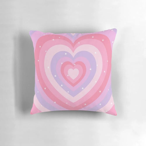 Soft, heart-shaped decorative pillow in pastel colors