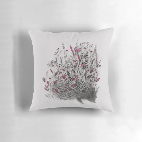 Soft and plush hedgehog-shaped pillow with detailed design and natural colors