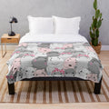 Soft and cuddly hippo patterned plush blanket for cozy home decor
