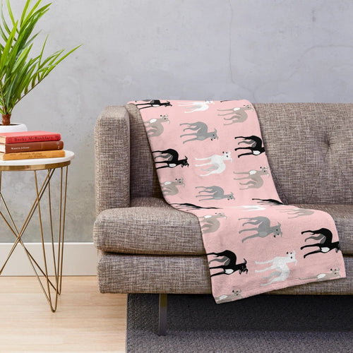 Soft and cozy plush blanket featuring a pink pattern design with Italian Greyhounds or Whippets