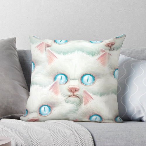 Soft and cuddly pillow featuring an image of a white kitten with big eyes