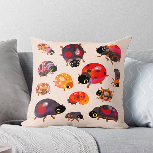 A soft, plush pillow featuring a cute lady beetle or ladybug design, perfect for adding a touch of nature-inspired whimsy to your space.