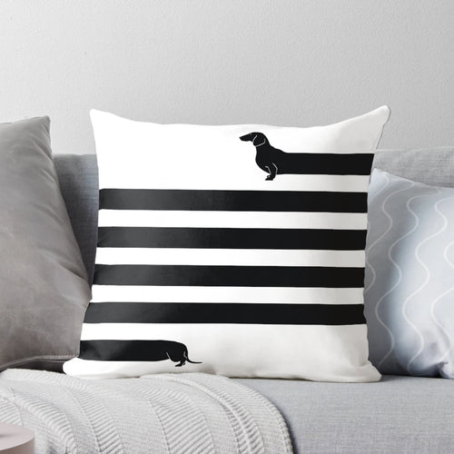 Soft and snuggly long dog pillow featuring a dachshund design