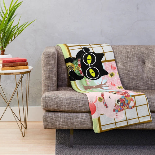 Maneki Neko plush blanket with a cute lucky cat design
