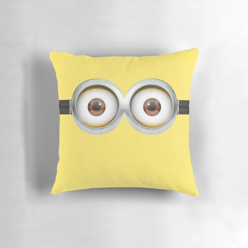 Plush minion-themed pillow with eyes design