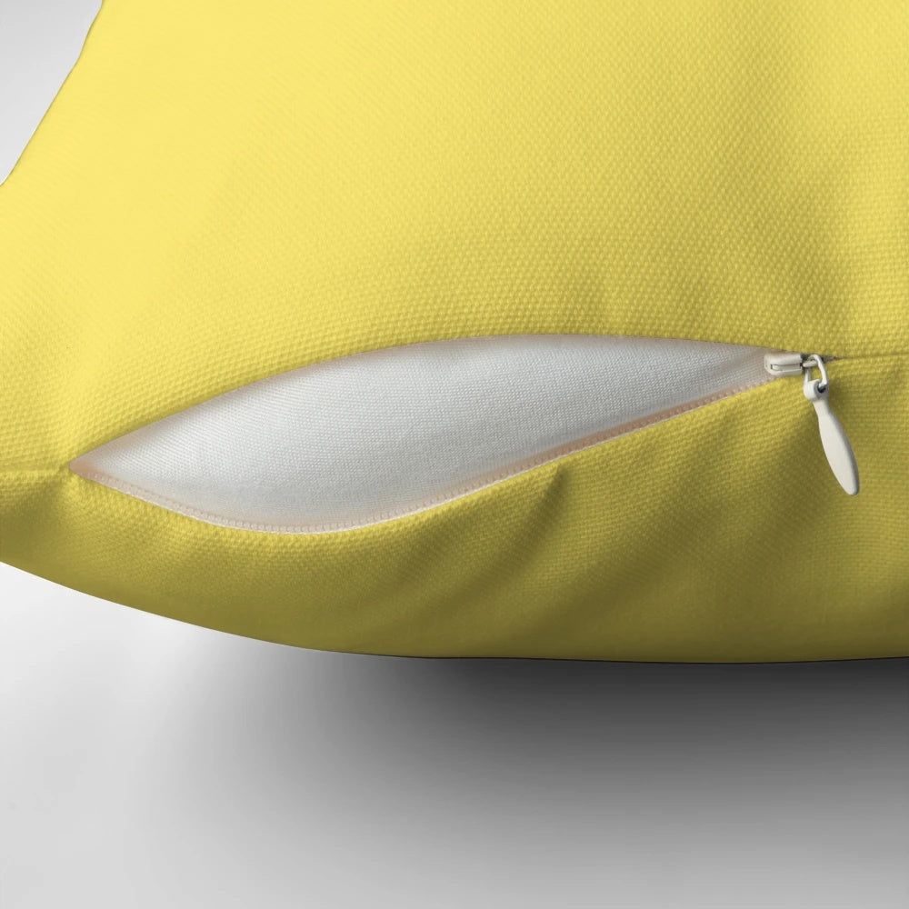 Plush minion-themed pillow with eyes design
