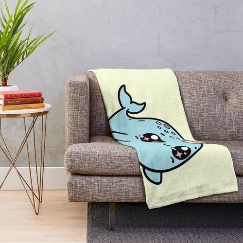 Soft and cuddly narwhal plush blanket in a blue shade
