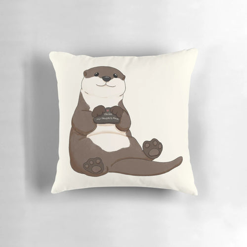 Cute and smiling otter printed on a cozy pillow, perfect for adding a touch of adorable to any space.