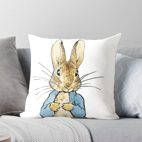 Soft, plush Peter Rabbit pillow by Beatrix Potter, perfect for kids' rooms and nursery decor