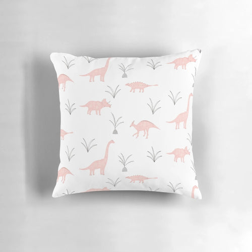 A fluffy pink pillow with a charming dinosaur print, perfect for adding a touch of whimsy to any space.