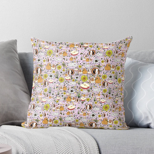 A soft, plush pillow featuring a charming guinea pig design in shades of pink.