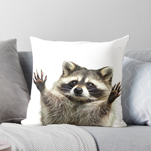 Soft and cuddly racoon-shaped pillow perfect for nursery or children's room