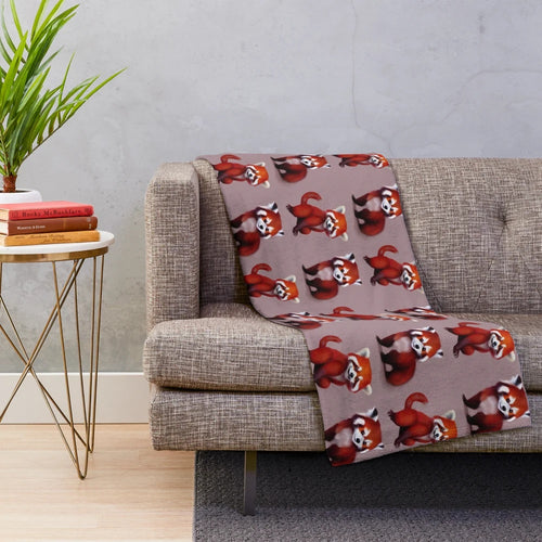 Soft and cuddly red panda plush blanket with a cute ginger bear design