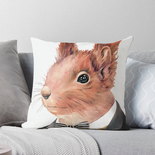 A decorative pillow featuring a cute red squirrel dressed in a tuxedo, perfect for a woodland-themed nursery or child's room.
