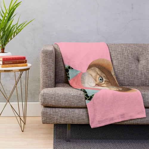 A cozy and cute plush blanket featuring a rodeo kitty or cowboy cat design