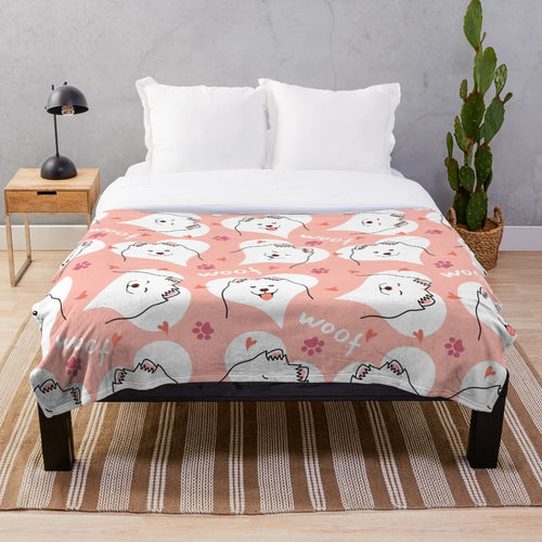 Soft and cuddly pink plush blanket featuring a cute Samoyed dog emoji design