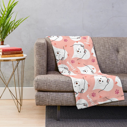 Soft and cuddly pink plush blanket featuring a cute Samoyed dog emoji design