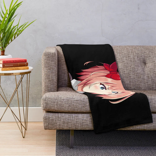 Cute Sayori anime girl pouting on a plush blanket
