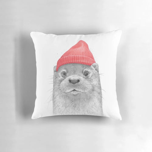 Soft, cuddly sea otter plush pillow with a red hat, perfect for snuggling and home decor.
