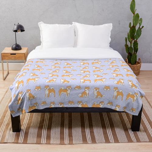 Shiba Inu plush blanket with a cute and kawaii pattern