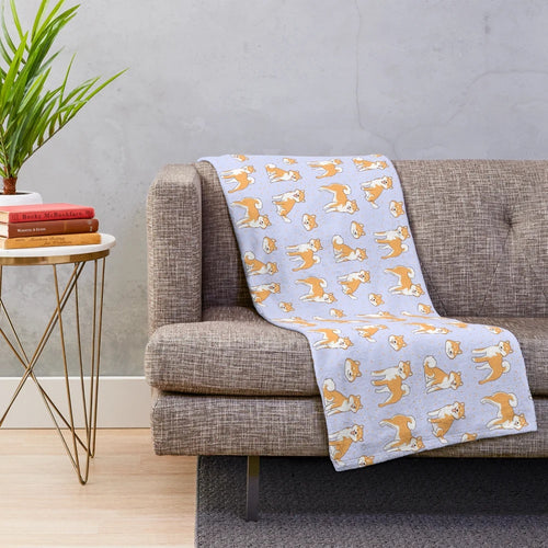 Shiba Inu plush blanket with a cute and kawaii pattern