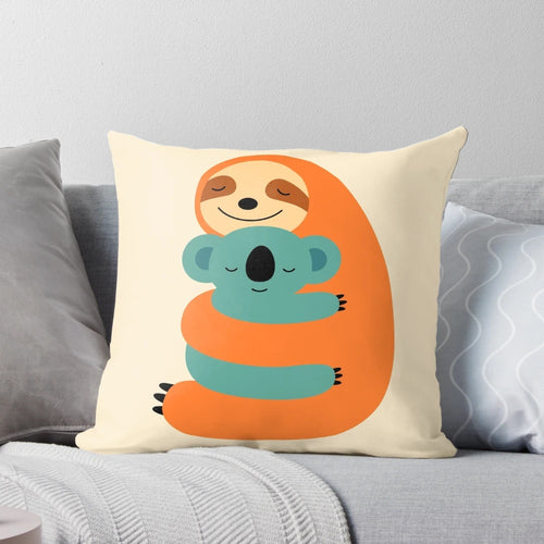 Colorful sloth and koala plush pillow with a heart design