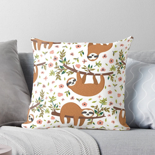 A plush, kawaii-style pillow featuring a cuddly sloth design in shades of gray and brown with a cute, chibi-inspired expression.