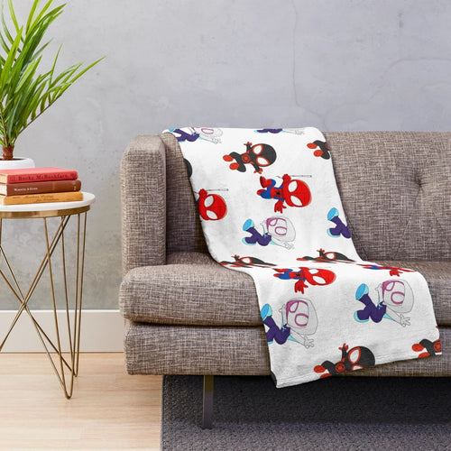 Plush blanket featuring a variety of spider-themed designs, including black spidey and cute cartoon spiders
