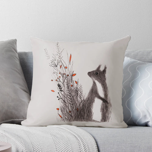 A soft, plush pillow featuring a sweet and whimsical squirrel design, perfect for adding a touch of nature-inspired charm to your home.